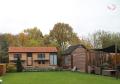 Het nieuw gebouwde hok bewees in 2012 uit "het goede hout" te zijn gesneden. Links het kweekhok met enkele rennen daar tegenaan gebouwd. De ideale verblijfplaats van duivers en duivinnen tijdens het 'stille' seizoen.