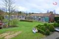 De tuinhokken en de volières voor jonge duiven en duivinnen.